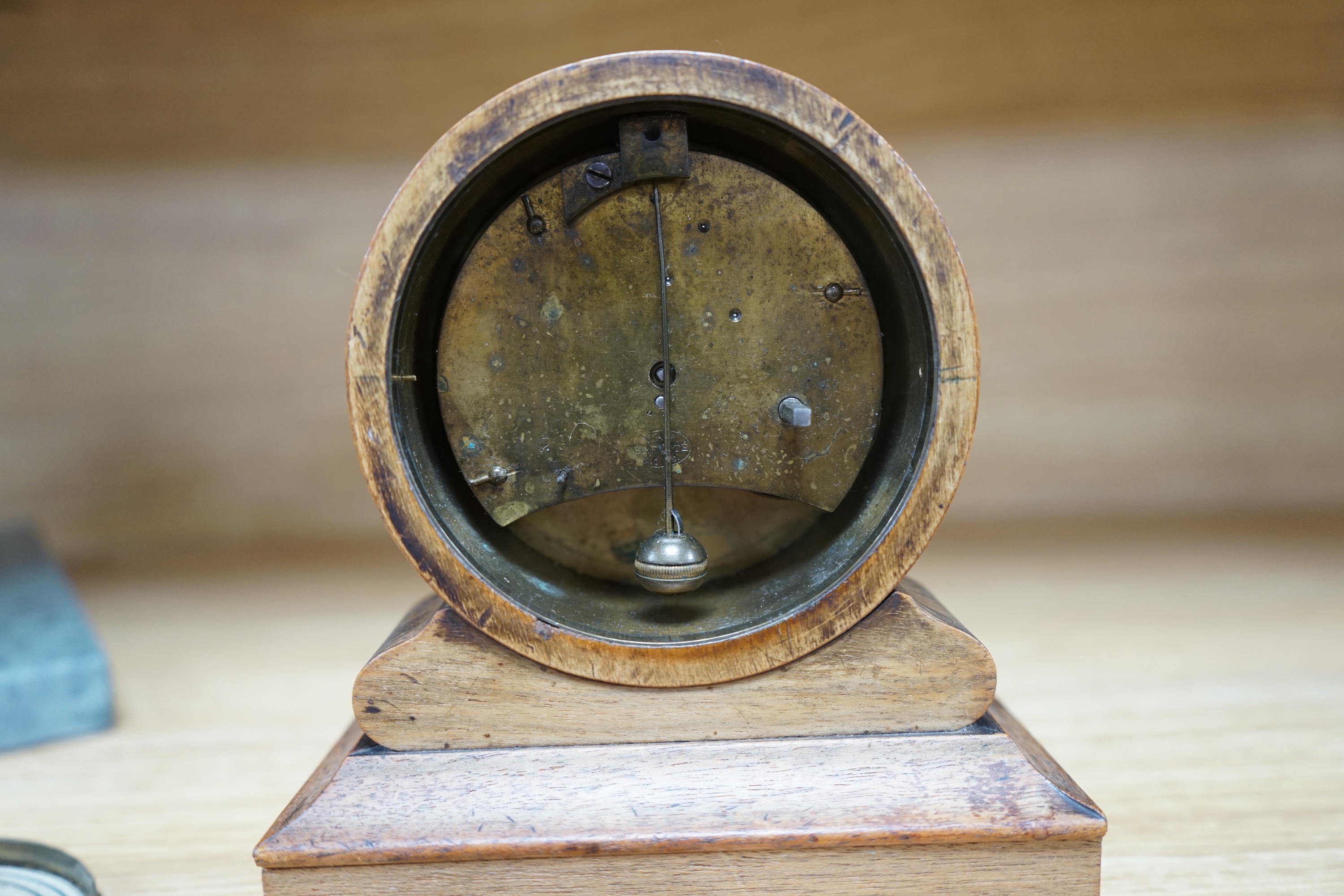 A French tic-tac movement timepiece, 19th century, in a walnut case, 15.5cm high. Condition - fair.